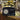 ByronStatics Black AM FM Radio - Small Portable Radios Vintage/Retro with Headphone Jack, Large Analog Rotary Tuning Dial - Power Plug or 4 x 1.5V AA Battery